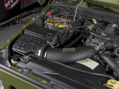 Car engine compartment with aFe Momentum GT Stage 2 Pro 5R Intake System for Jeep Wrangler