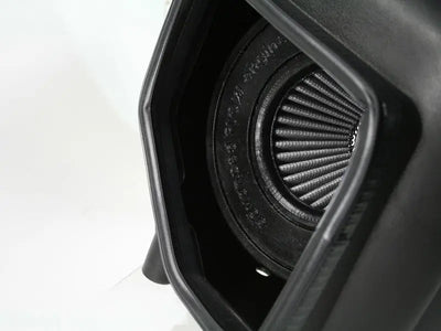 Black air filter inside housing for aFe Momentum HD Pro Dry Stage-2 Intake System GM Diesel Trucks