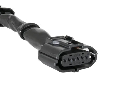 Black electrical connector with multiple pins for aFe Power Sprint Booster power converter