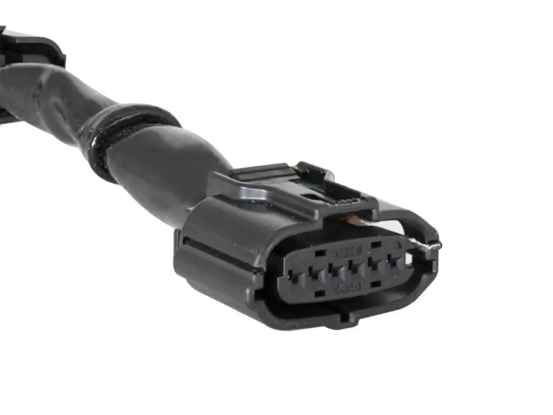 Black electrical connector with multiple pins for aFe Power Sprint Booster power converter
