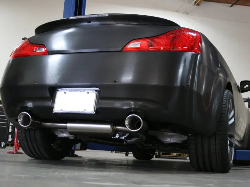 aFe Takeda 2-1/2" 304SS Cat-Back Exhaust System with Polished Tips on Infiniti G37/Q60 V6-3.7, rear view.