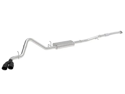 Silver exhaust system with dual black tips from afe vulcan series on 2019 GM Silverado