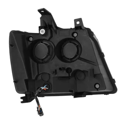Rear view of black Toyota Tundra projector headlights with wiring for Pro-Series upgrade