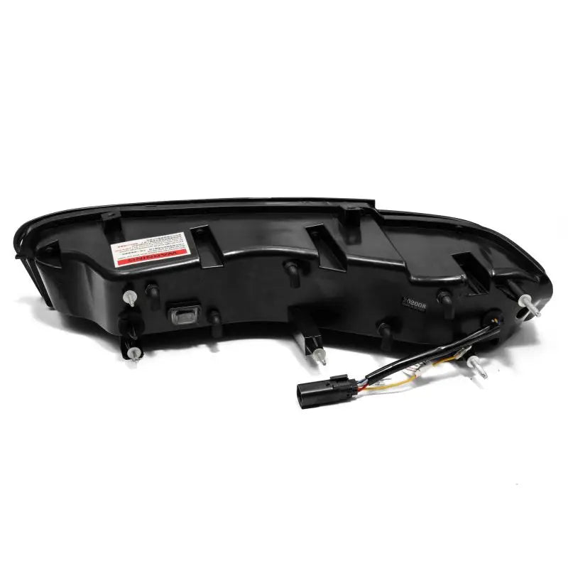 Black plastic bumper cover with wiring for AlphaRex Jet Black Chevrolet Camaro tail lights