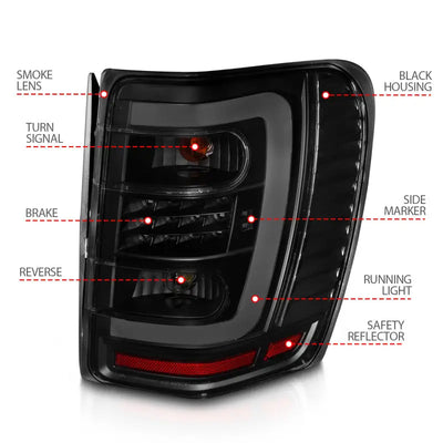ANZO 1999-2004 Jeep Grand Cherokee LED Tail Lights w/ Light Bar Black Housing Smoke Lens - Truck & Automotive