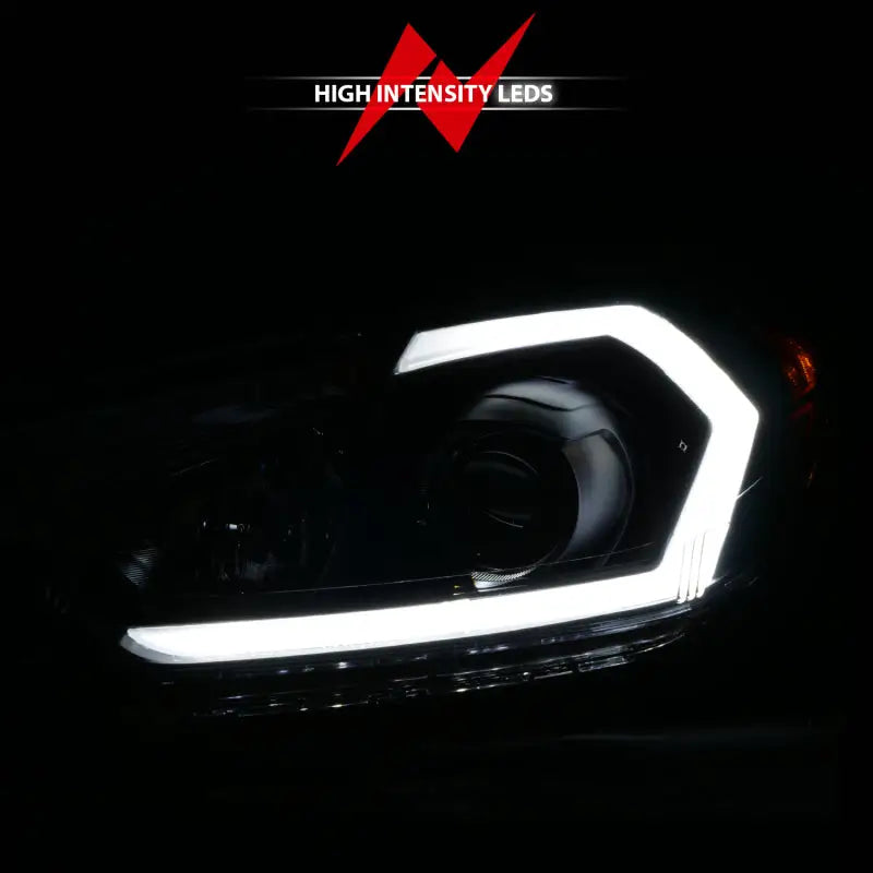 Sleek ANZO Kia Forte projector headlights with black housing, light bar and DRL