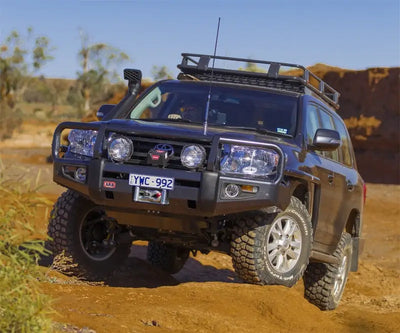 Black off-road SUV with ARB Winchbar H Lightwasher and Lightwasher ARBFog LC200