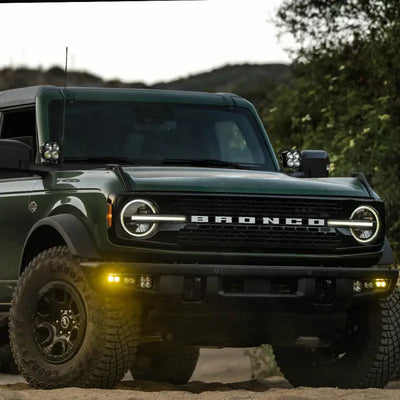 Green Ford Bronco with Baja Designs SAE Sportsmen Fog Light Kit and Steel Bumper