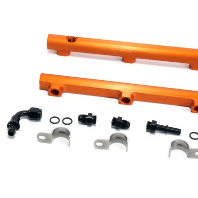 Orange fuel rail with black fittings and silver clamps from BBK Hemi fuel rail kit
