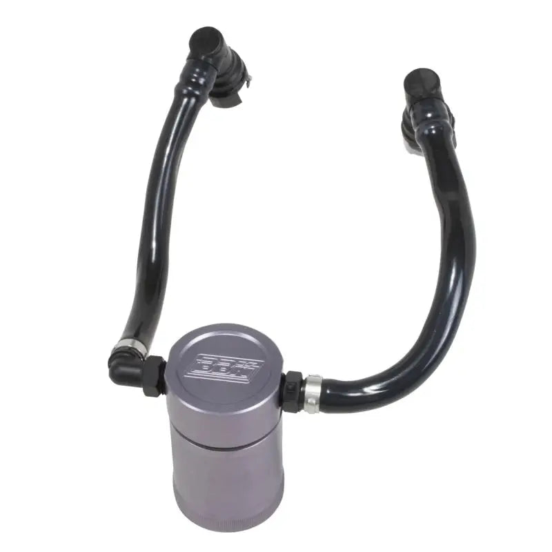 Gray oil separator can with black hoses from BBK 11-17 Ford Mustang GT oil separator kit