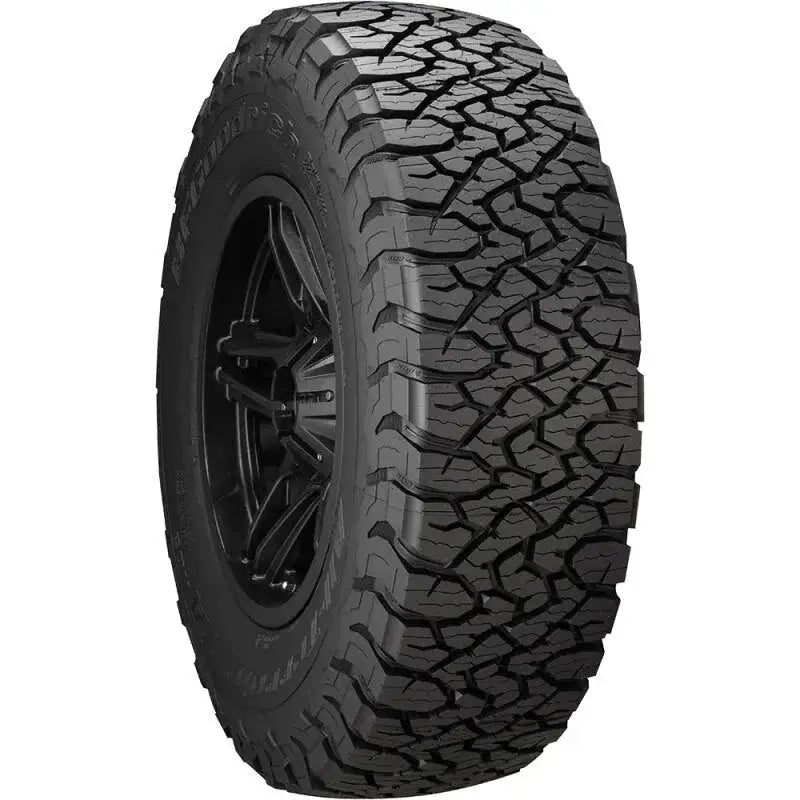 BFGoodrich All Terrain T/A KO3 LT305/70R18 128S tire with aggressive tread pattern for superior traction and durability.