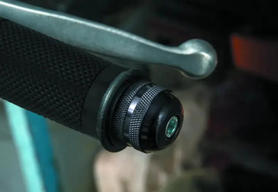 Motorcycle handlebar grip with BikeMaster Anti-Vibration Bar Ends for smoother ride