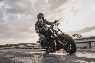 Motorcycle with rider using Bikemaster Flywheel Puller 38mm on bike engine