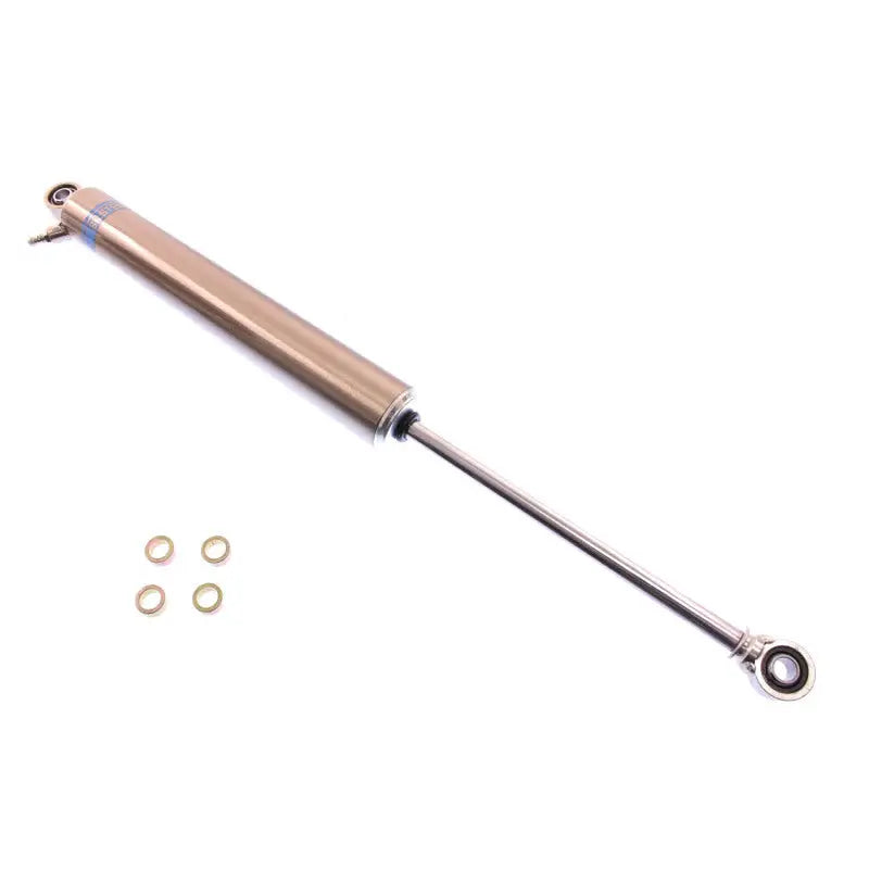 Silver and gold Bilstein Motorsport 12in shock absorbers with washers for ultimate performance