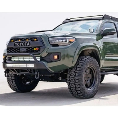 Green Toyota Tacoma with off-road mods and CR3384 Cali Raised Stealth Bumper