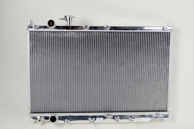 Silver aluminum Honda S2000 radiator for improved cooling and performance