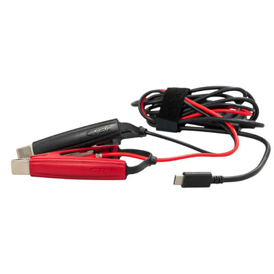Red and black CTEK CS FREE portable jump starter with USB ports and free USB-C charging cable