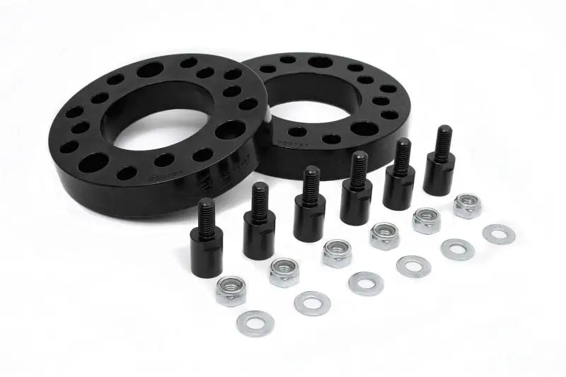 Daystar 2009-2021 Ford F-150 Front 4WD/2WD 2in Leveling Kit with suspension strut spacers, hardware, and easy install components.