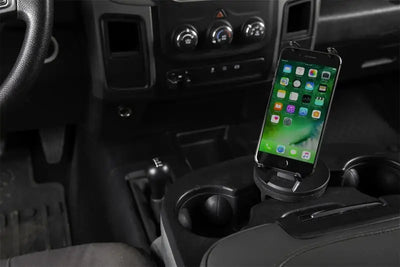 Daystar Universal Hands-Free Phone Grip in a vehicle's cup holder, ensuring secure and convenient smartphone placement with 360° view rotation, suitable for RV, Automotive, Powersports, off-road, marine, exterior, truck accessories, interior, truck bed, RV parts, Truck & Automotive, AVADA - Best Sellers