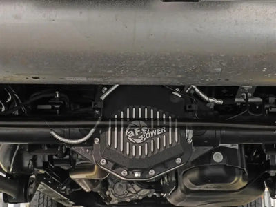 Black dielectric cover with cooling fins for Dana M220 with magnetic drain plug