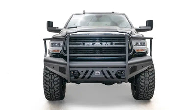Front view of a truck with DR19-Q4460-1 Fab Fours Black Steel Elite Front bumper, showcasing its durable steel construction and sleek design for enhanced front-end protection.