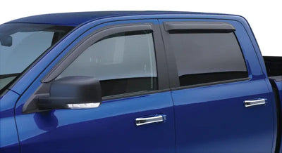 Blue Chevy 1500 pickup truck with EGR window visors in dark smoke