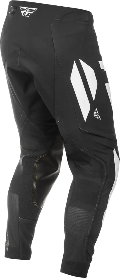 Black motocross pants with white accents from Evolution Dst Pants for off-road riding