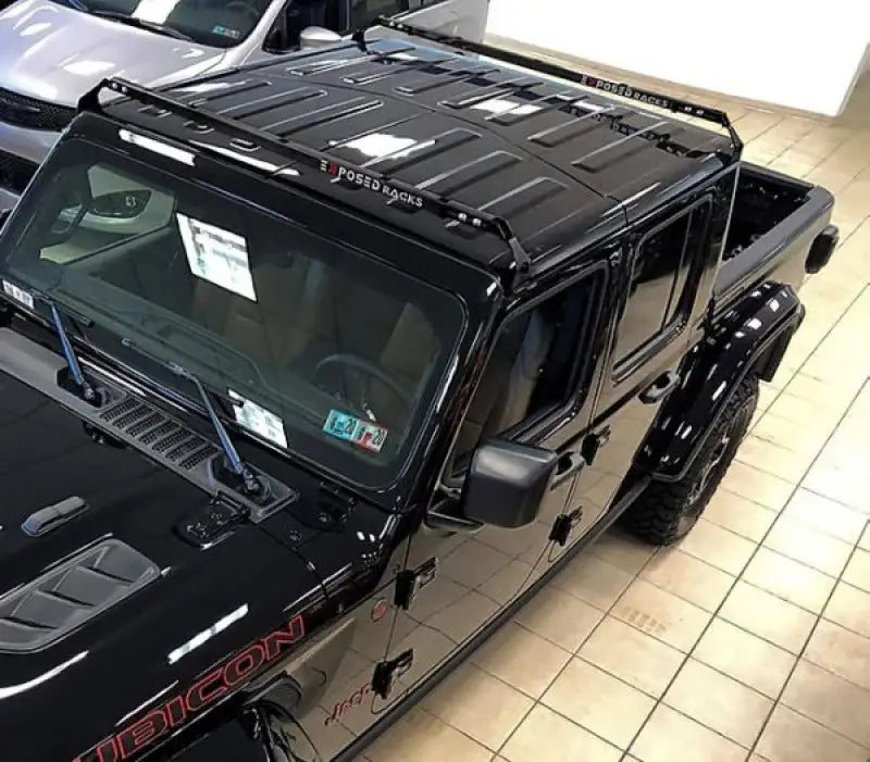 Black Jeep Wrangler Rubicon with Exposed Rack 8-00-9755-BK roof rack kit and spare tire