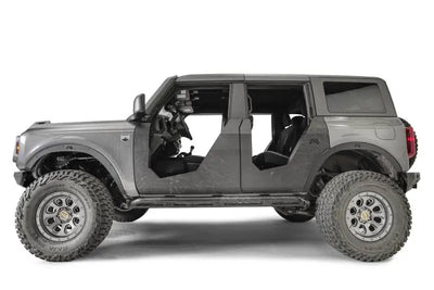 Gray four-door off-road vehicle with fab fours flare delete for rugged look