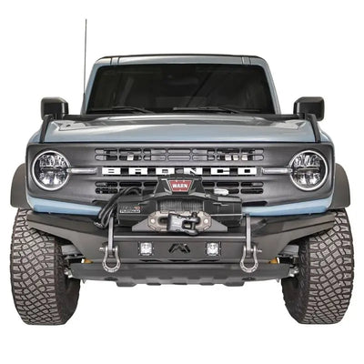 Front view of a vehicle showcasing the FB21-B5252-1 Fab Fours Stubby Front Bumper with a rugged design and high-quality construction.
