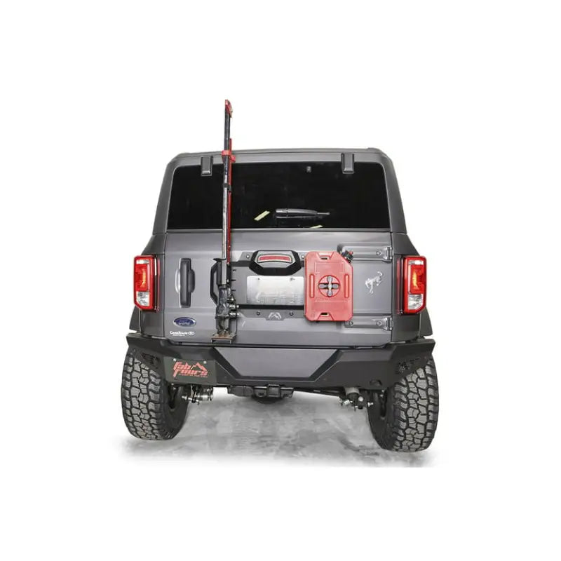 Rear view of a Ford vehicle equipped with the FB21-Z5251-1 Fab Fours 21-22 Ford Bro Spre Tre Del Pla, featuring a sleek and durable bumper for superior road debris protection.