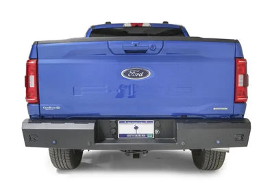 Blue Ford pickup truck with Fab Fours Red Steel Rear Bumper FF21-RT5150-1