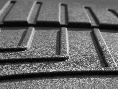 Black WeatherTech floor liner molded fit with textured grid pattern