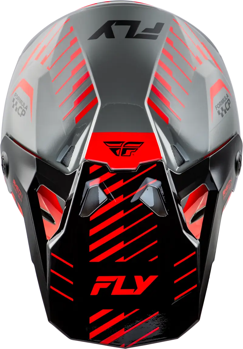 Gray and black motocross helmet with red accents featuring impact energy cells for protection