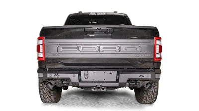 FR21-W5351-1 Fab Fours Premium Rear bumper installed on Ford F-150 Raptor, showcasing its rugged design and durable construction for enhanced rear-end protection.