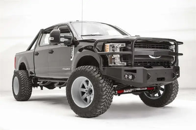 Fab Fours FS17-A4150-1 winch bumper on a 2017 Ford F250-350, showcasing a rugged black and gray design with enhanced front-end protection.