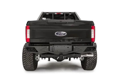 Rear view of a black Ford F250 equipped with FS17-E4151-1 Fab Fours 17 Ven Sen R, showcasing its rugged design and enhanced protection features.