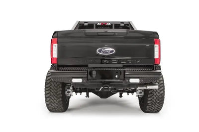 FS17-T4150-1 Fab Fours rear bumper on a Ford F250/F350, showcasing rugged construction and sleek design for superior protection and style.