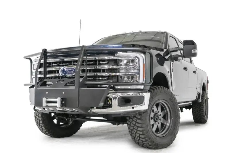 FS23-N5970-1 Fab Fours Winch Mount installed on a heavy-duty truck, enhancing off-road capability and providing durable, stable winch mounting. Ideal for RV, Automotive, Powersports, exterior, truck accessories, Winches & Hitches, AVADA - Best Sellers, Must Haves