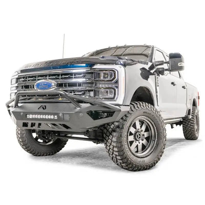 FS23-V5952-1 Fab Fours Vengeance Front bumper on a rugged white truck with aggressive styling and durable construction.