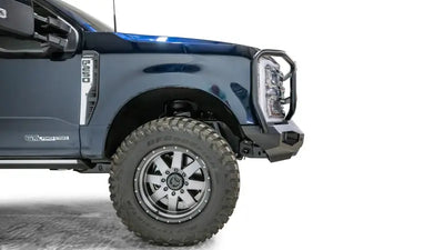 FS23-X5950-1 Fab Fours Matrix Front bumper on a blue truck, showcasing superior protection and sleek design, suitable for off-road and urban use, RV, Automotive, Powersports, off-road, marine, exterior, truck accessories, interior, truck bed, rv parts, Bumpers, Grilles & Guards, AVADA - Best Sellers, Must Haves