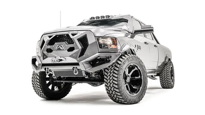 GR2900-1 Fab Fours 16+ Dodge HD Grumper, aggressive front view showcasing integrated grille and durable construction, enhancing the rugged appearance of a lifted Dodge HD truck.