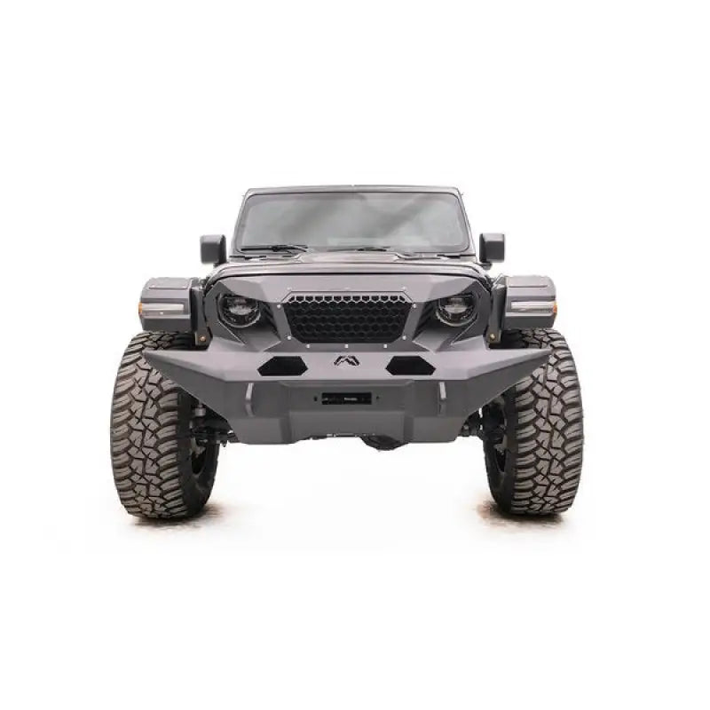 Front view of a vehicle featuring the GR4610-1 Fab Fours 18 Jp Jl Grumper Full Width, showcasing its full-width design and rugged appearance.