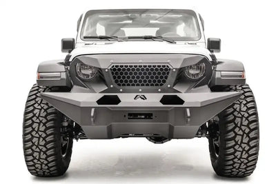 Front view of a white Jeep equipped with GR4610-1 Fab Fours 18 Jp Jl Grumper Full Width, showcasing its aggressive and protective full-width design.