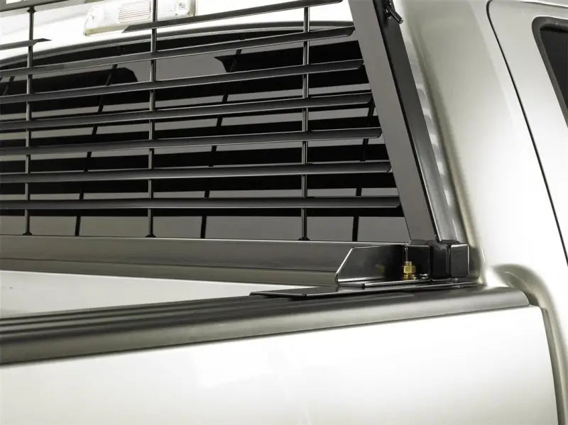 Black headache rack mounting kit with louvered window guard for Backrack racks