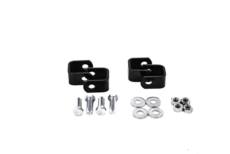 Black metal brackets with hardware for Hellwig End Links Clevis Kit installation