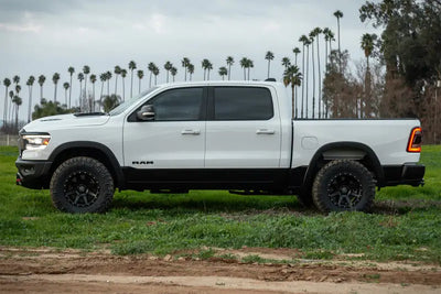 ICON 2019+ Ram 1500 2/4WD with .75-2.5in Stage 1 Suspension System showcasing increased wheel travel and ride quality enhancement.