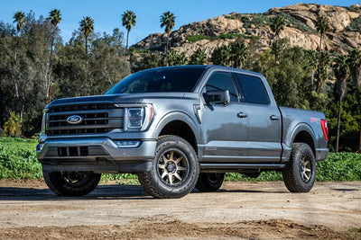 Gray Ford F150 4WD pickup truck with ICON 21-23 Ford F150 4WD coilover kit