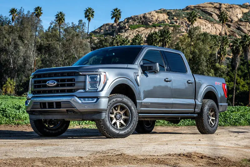 Gray Ford F150 4WD pickup truck with ICON 21-23 Ford F150 4WD coilover kit