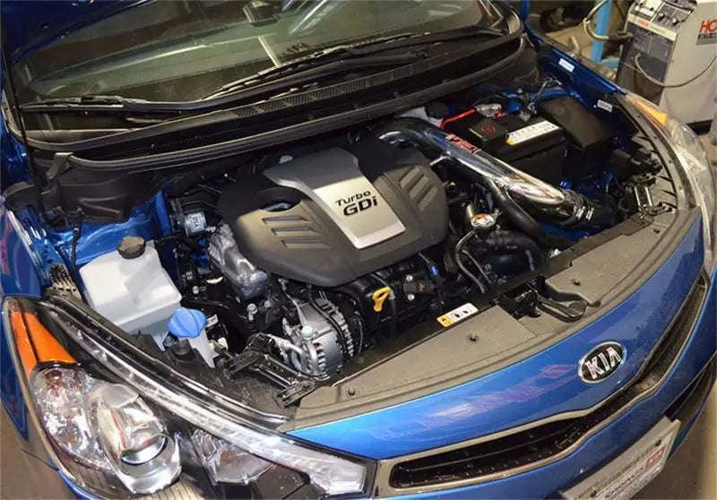 Injen 2014 Kia Forte' Koup 1.6L Turbo 4Cyl Polished Cold Air Intake installed in engine bay.